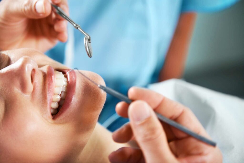 A dental cleaning an checkup is pictured